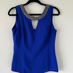 Beautiful elegant XOXO Top. Blue. New No tags